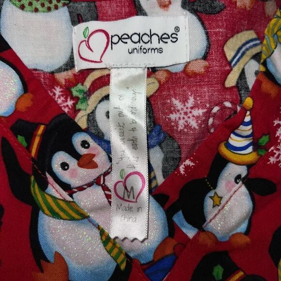 Peaches Uniforms short sleeve Penguin holiday scrub top women’s size medium - Picture 6 of 7